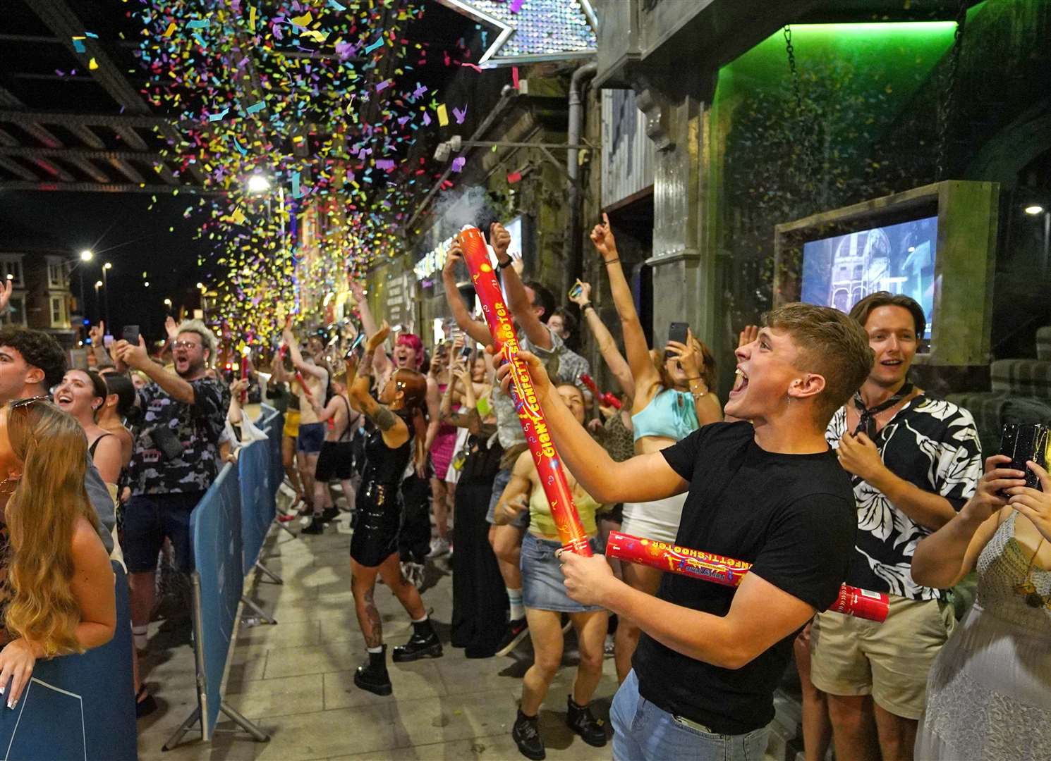 People queue for the Viaduct Bar in Leeds, after the final legal coronavirus restrictions were lifted in England at midnight (Ioannis Alexopoulos/PA)