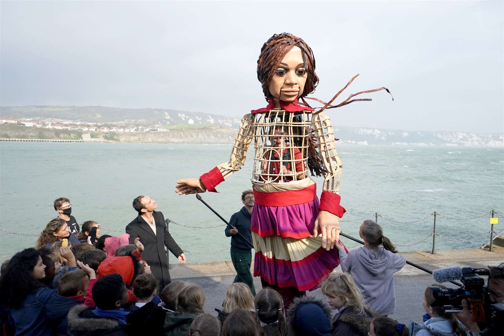 Little Amal arrives in Folkestone in Kent (Gareth Fuller/PA)