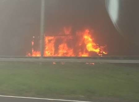 The lorry engulfed in flames. Picture: Sophie Child.