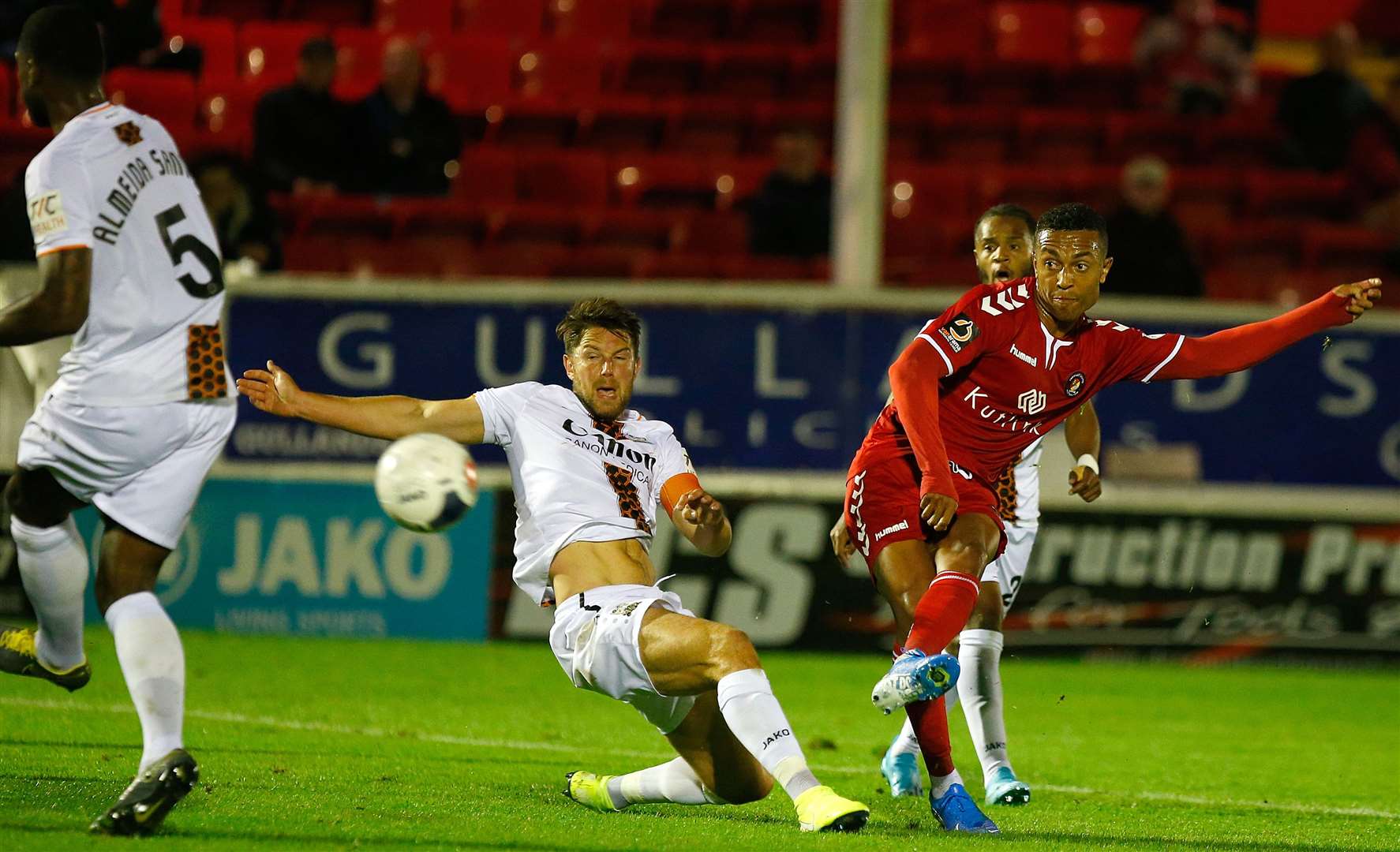 Fleet's Alex Reid scores against Barnet on Tuesday night. Picture: Andy Jones