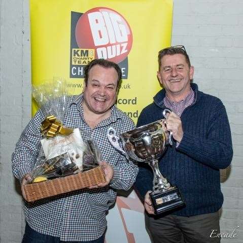 Shaun Williamson of the 2019 KM Big Charity Quiz winning team the Unicorn Inn with KM Charity Team CEO Mike Ward. Picture: Encade