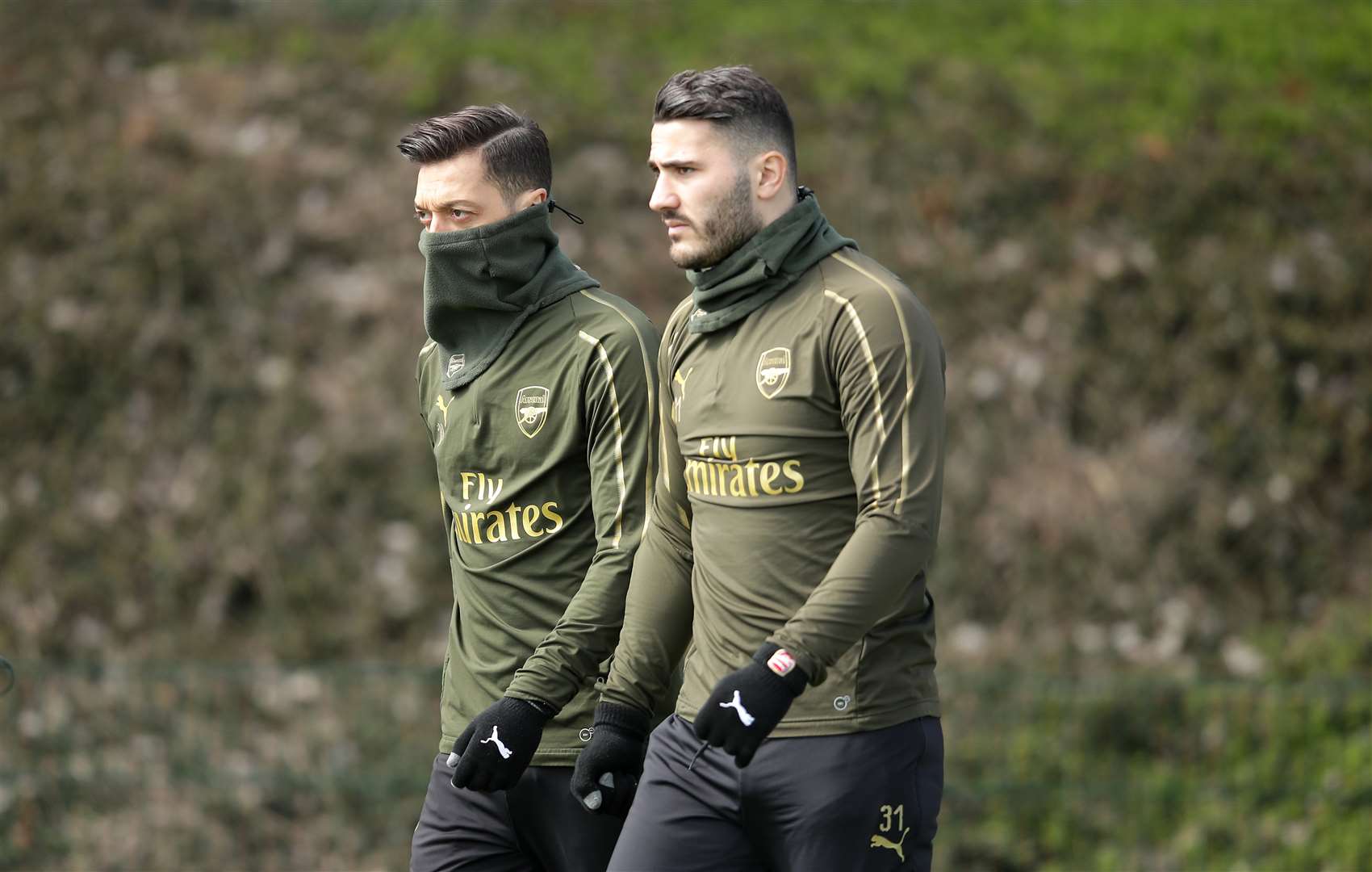 Mesut Ozil, left, and Sead Kolasinac (Adam Davy/PA)