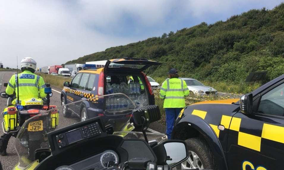 Water was handed out those who were stranded last weekend. Picture credit: @KentPoliceBikes