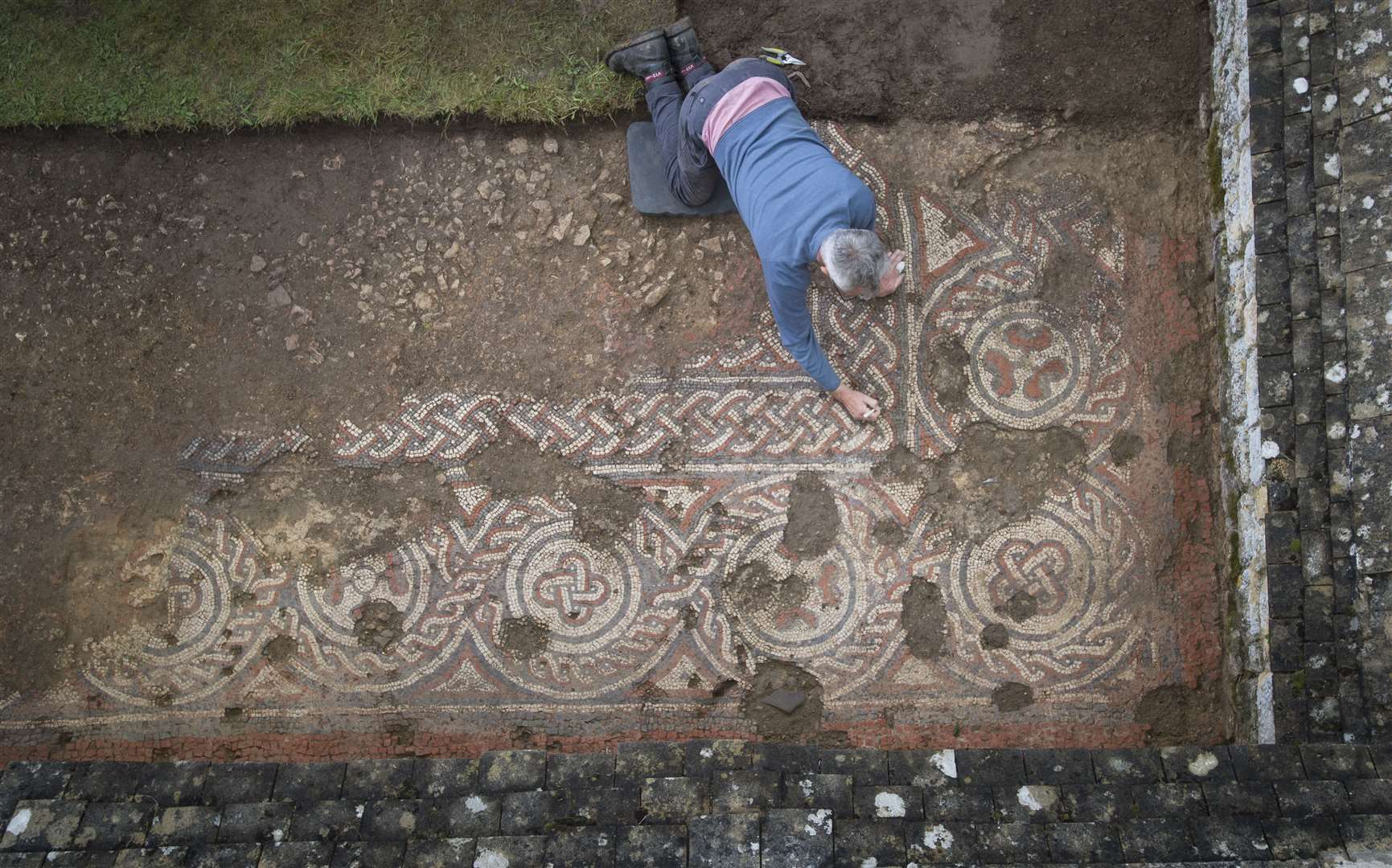 An expert at work at the Chedworth site (National Trust/PA)