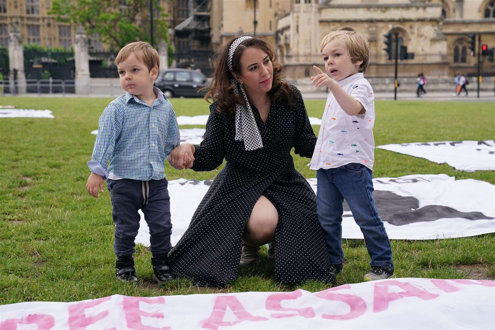 In 2021, Stella Moris and her children Gabriel (right) and Max joined supporters for a picnic in Parliament Square, central London, to mark their father Julian Assange’s 50th birthday (PA)