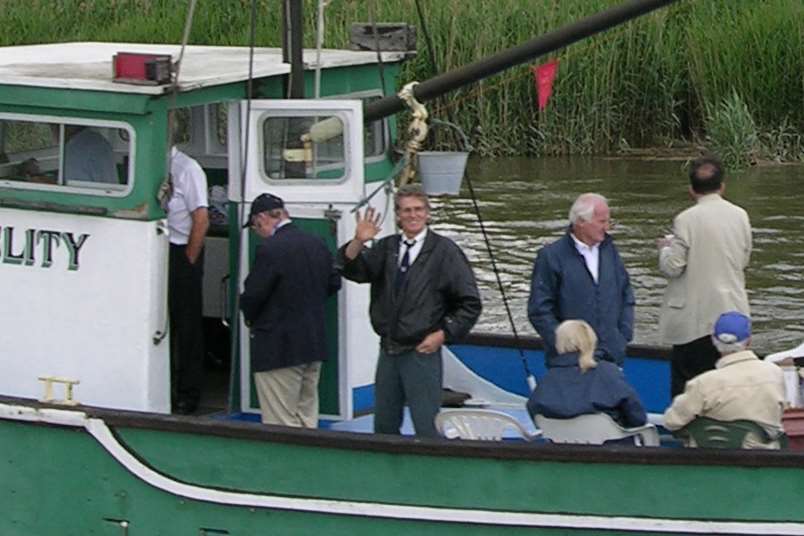 Steve Trice (waving) on board a local fishing boat - this is the last picture taken of him. Picture: Fred Trice.