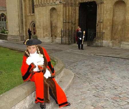 UNHAPPY: Cllr Val Goulden's expression speaks volumes as she sits outside the cathedral. Picture: BARRY CRAYFORD