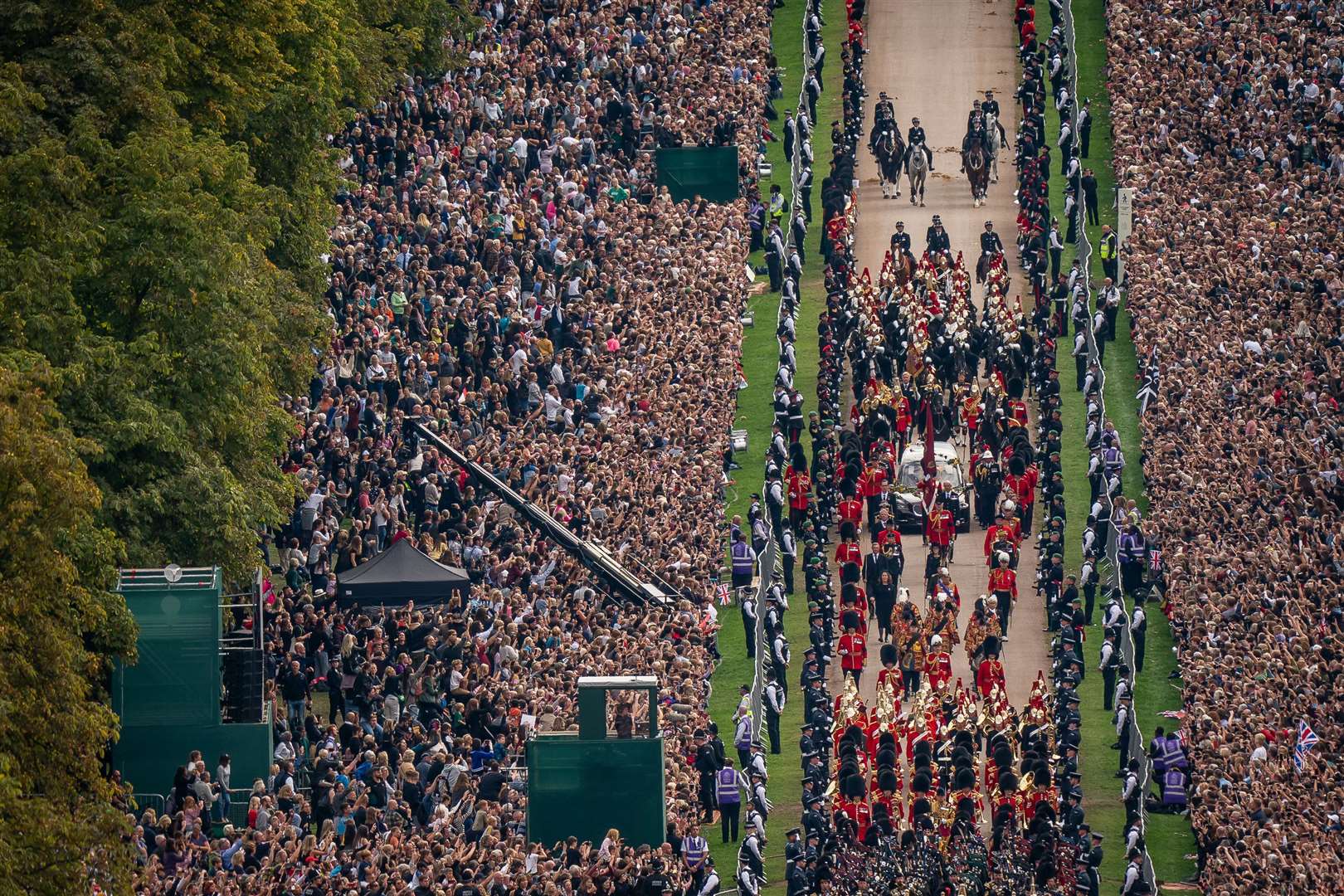 Thousands took to the Long Walk in Windsor to see the Queen’s funeral procession ahead of the committal service at St. George’s chapel (Aaron Chown/PA)