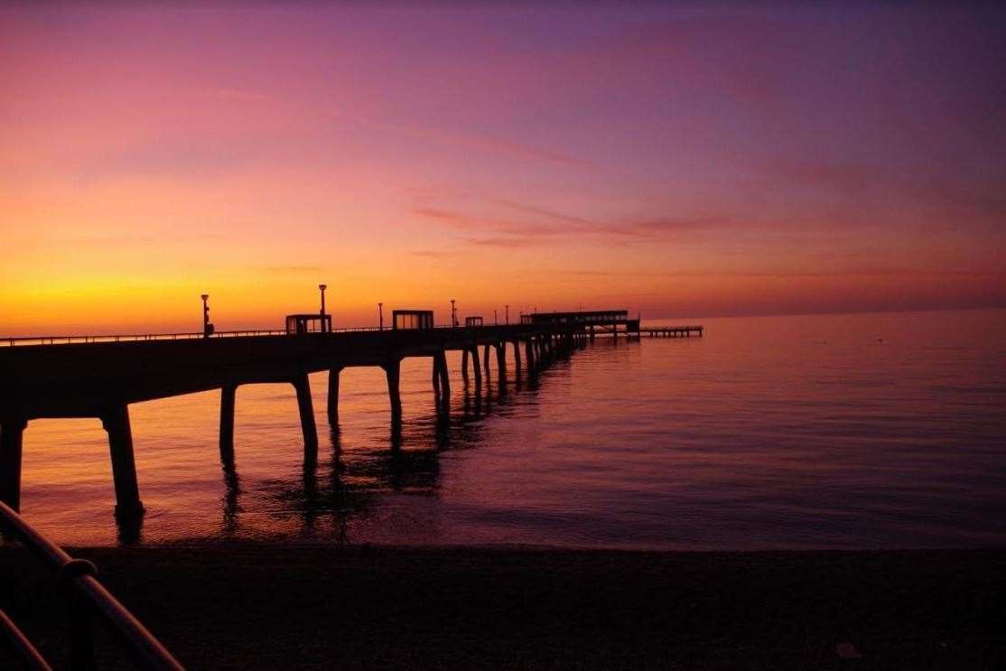 Take a romantic stroll along Deal pier as the sun sets