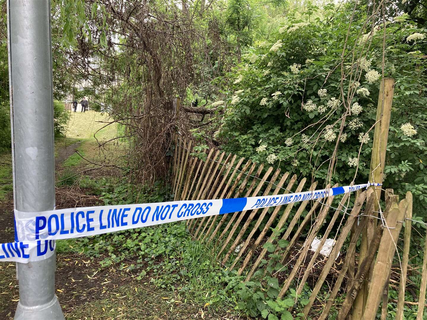 Police tape cordons off the area near where the remains were found (Beverley Rouse/PA)