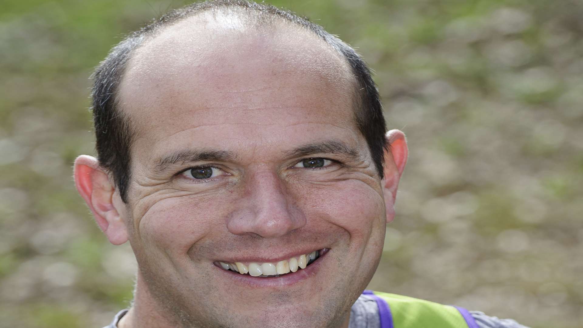 Michael "H" Harris, pictured outside Medway Park, Gillingham, is running this year's London Marathon in support of the Scouts