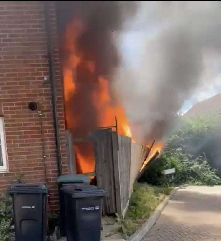 Flames spreading from the property in Jubilee Crescent. Image: Dwight Ryan/ GTown Talents