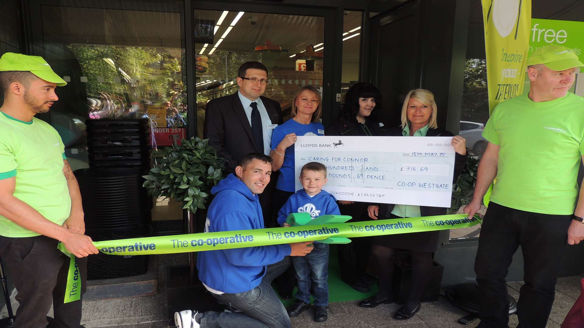 Connor Olsen cuts the ribbon at the newly refurbished Co-op store in Westgate-on-Sea.