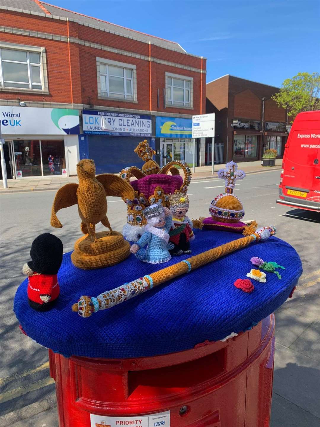 A postbox topper with contributions from Judit’s crochet group (Judit Kocsis-Barna/PA)