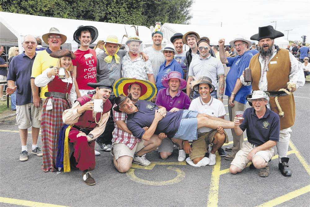 Fetching hat wear at the Aviator Beer Festival with Rotary president John Gurton