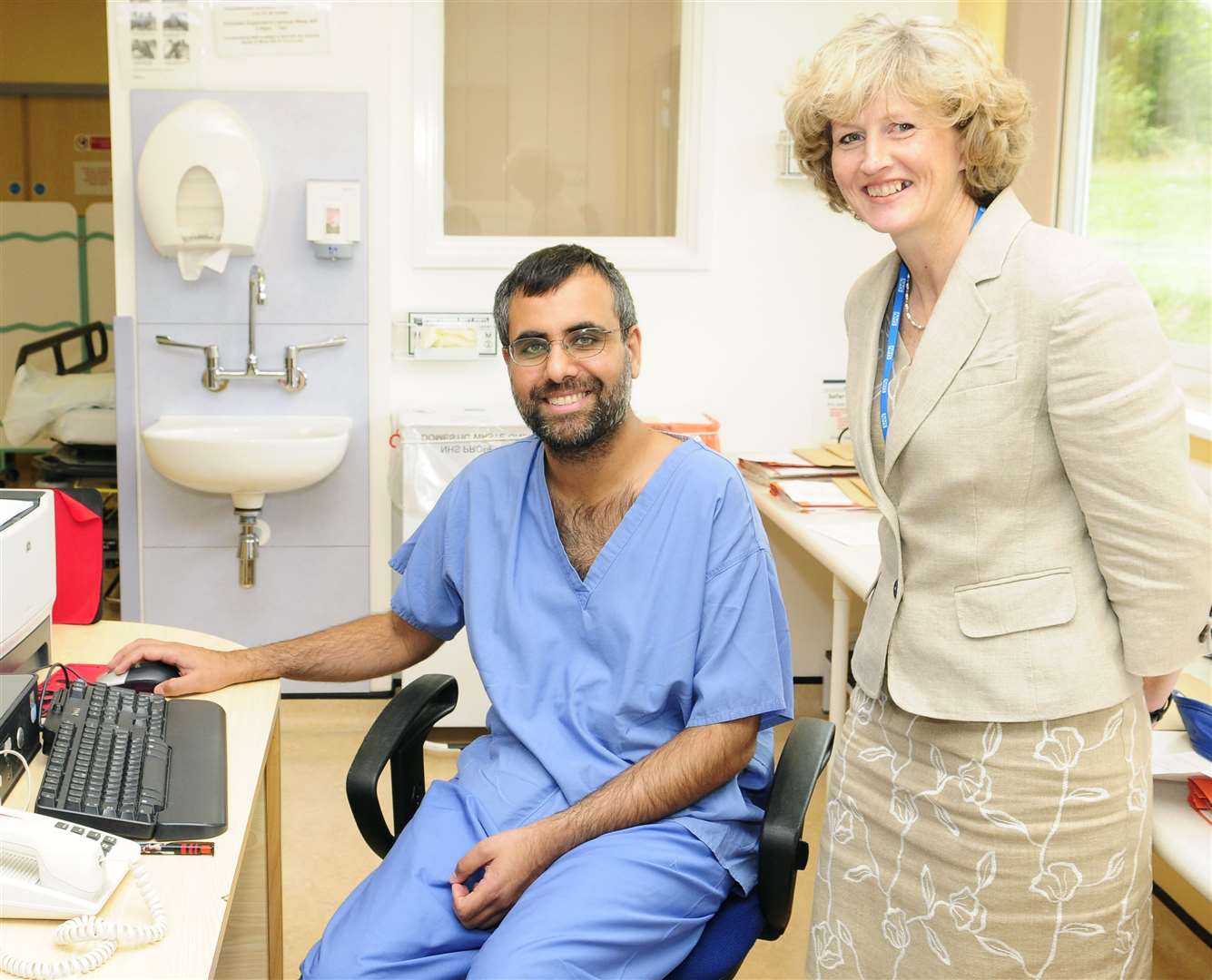 Darent Valley Hospital Doctor Jagdip Sidhu pictured in the heart centre day ward with then Trust chief executive, Susan Acott. Picture: Simon Hildrew.