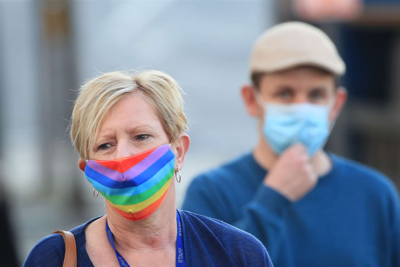 A woman wearing a face mask walks through the centre of Bradford, West Yorkshire (Danny Lawson/PA)