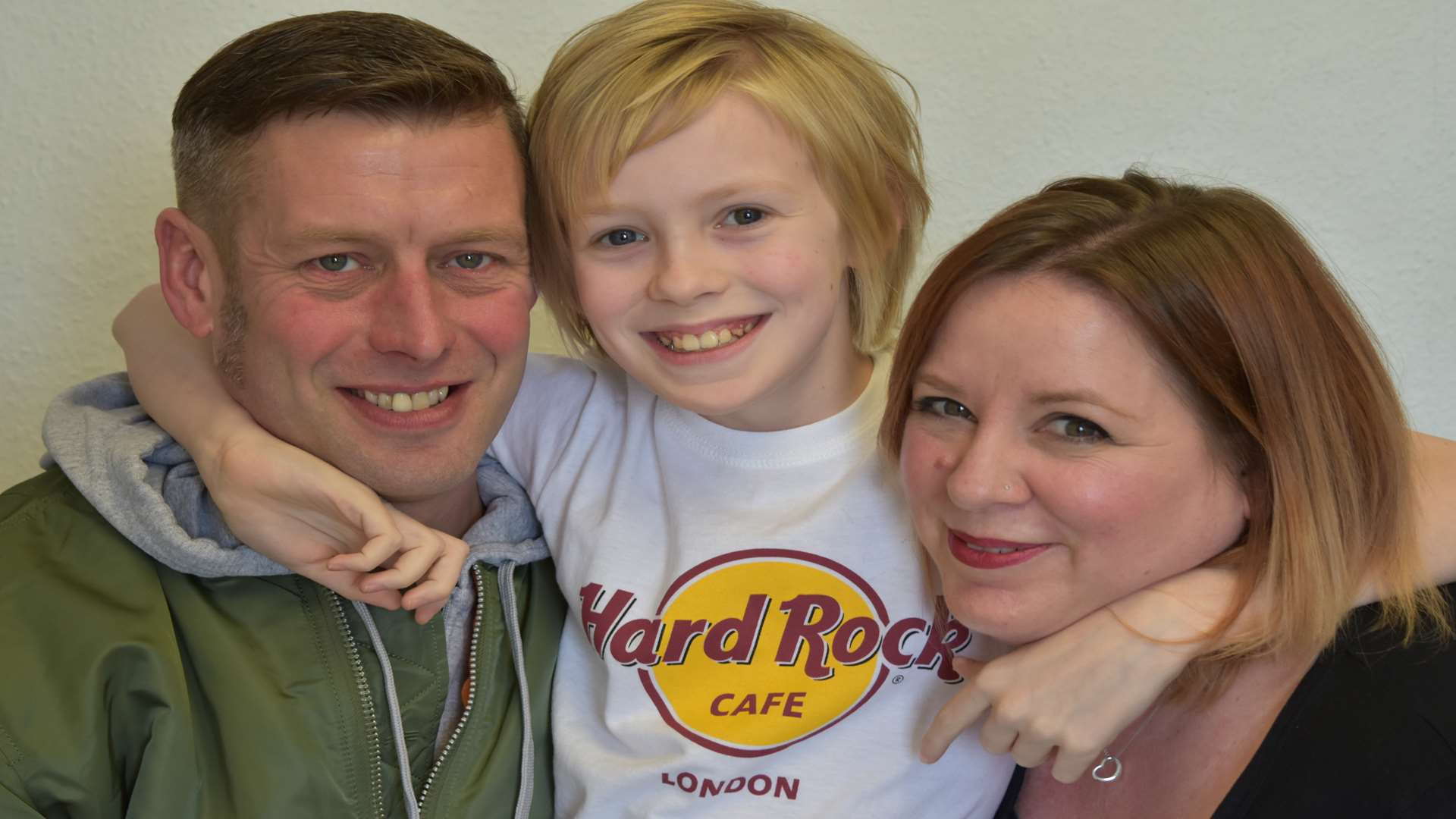 Isabel with her parents Marie and James Christian. Pic: Sam Hewish