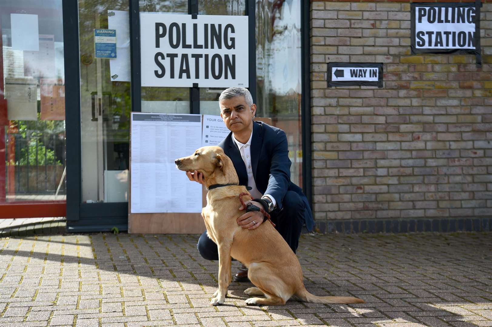 Mayoralty candidate Sadiq Khan took his dog Luna to his London polling station (Kirsty O’Connor/PA)