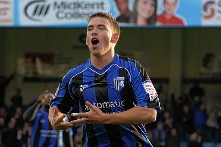 Cody McDonald celebrates taking the lead for Gillingham