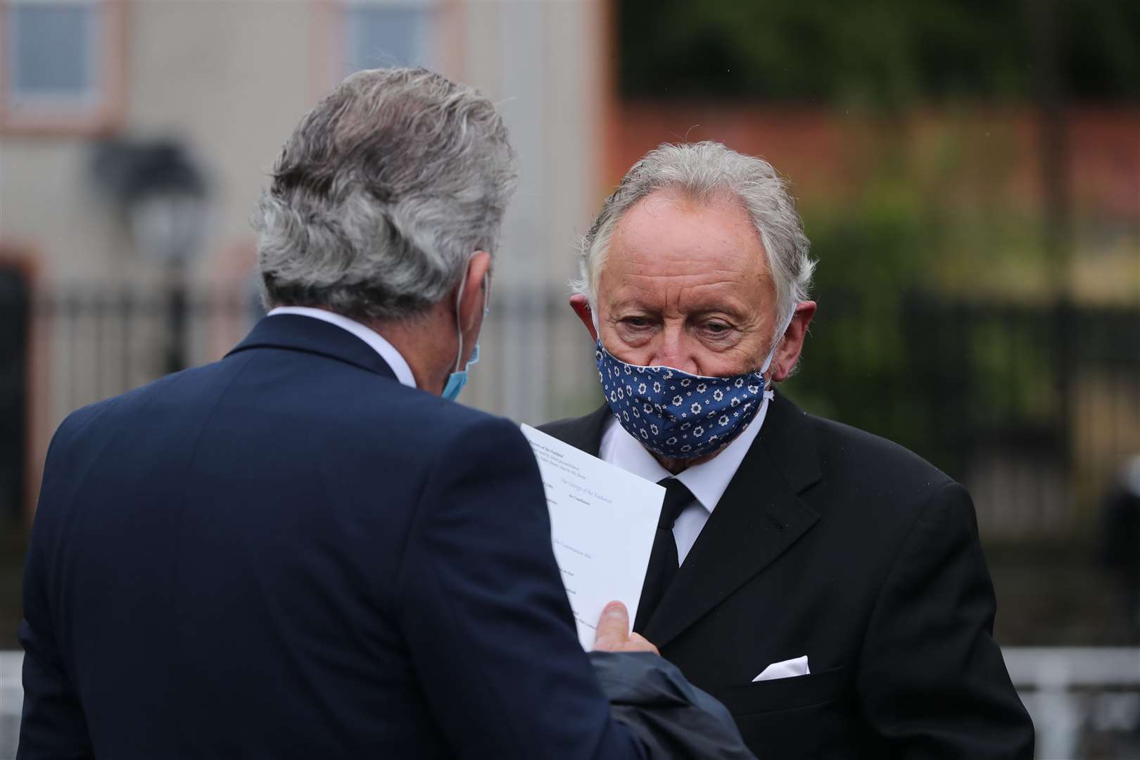 Phil Coulter (right) played The Town I Loved So Well at the close of Mr Hume’s funeral (Niall Carson/PA)