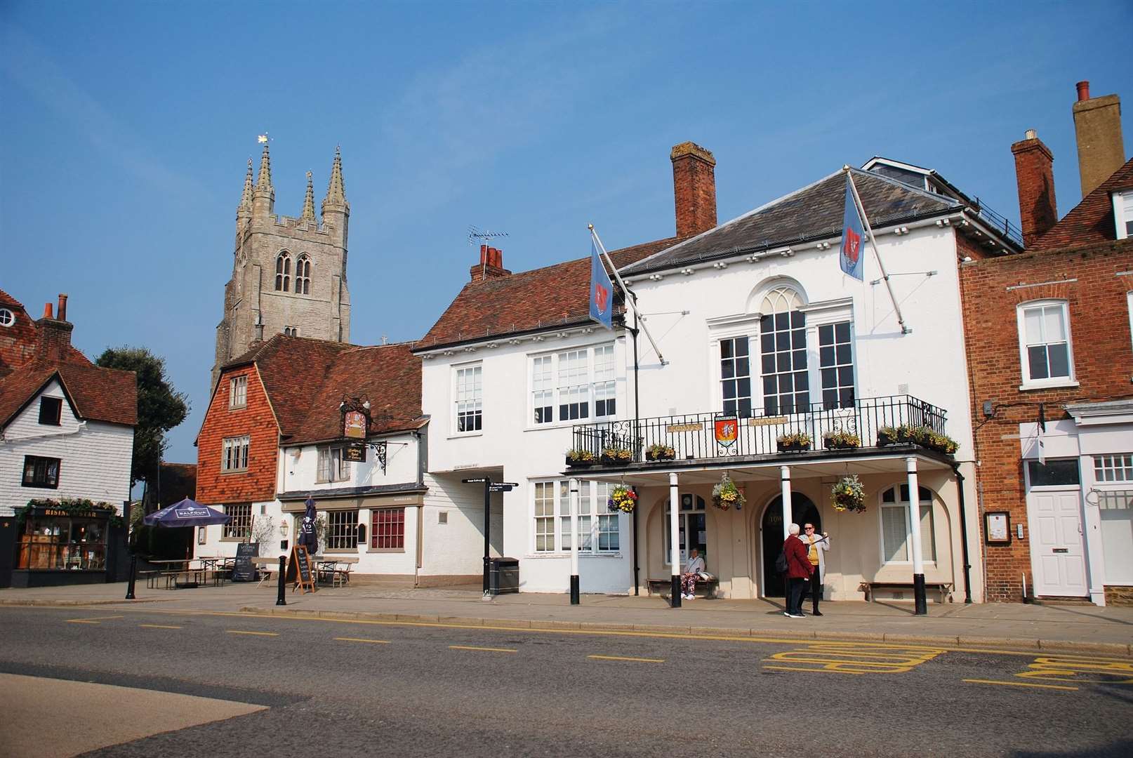 The Woolpack pub in Tenterden with St Mildred’s Church in the background