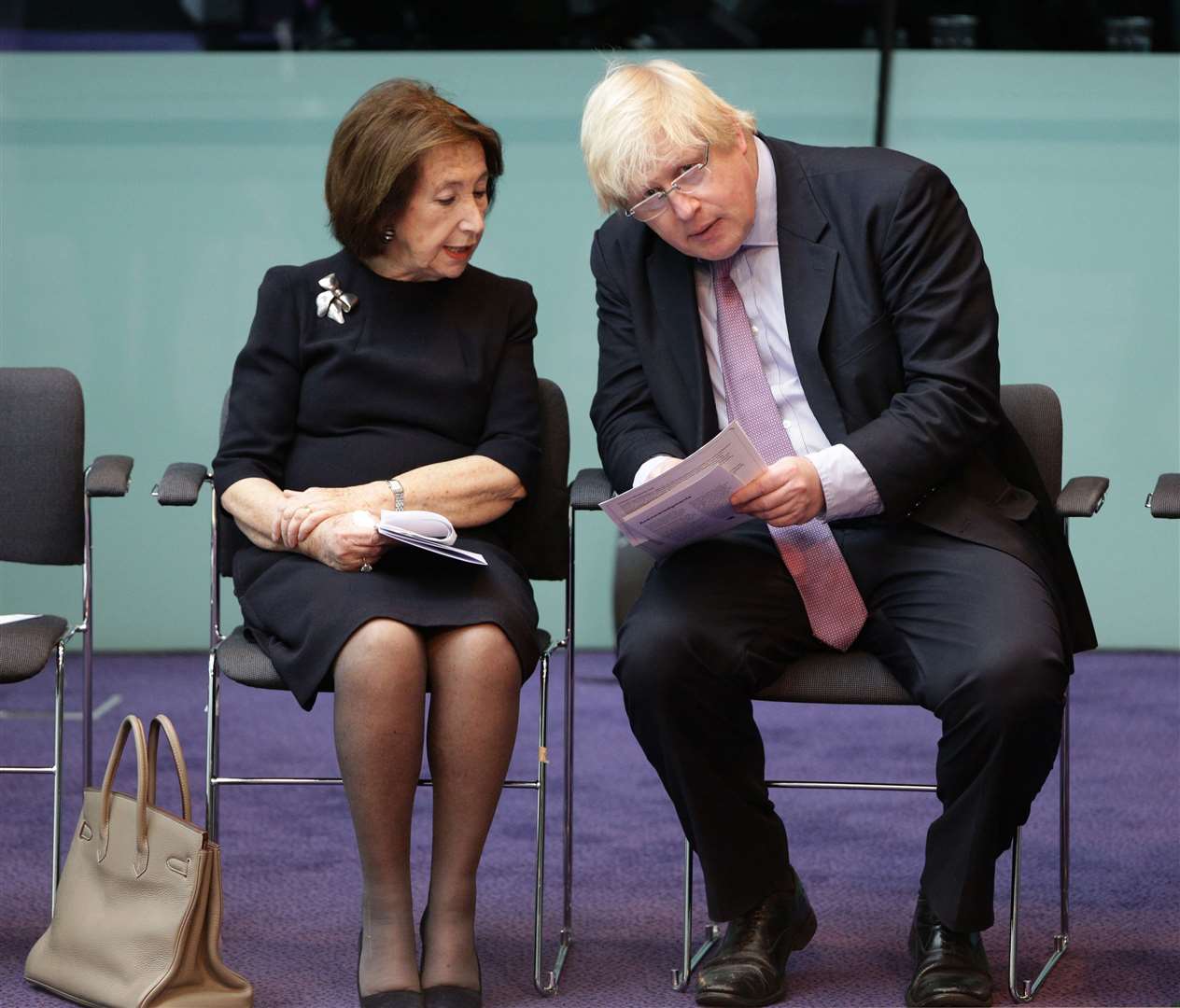 Hannah Lewis speaking to the then-mayor of London Boris Johnson during a Holocaust Memorial Day ceremony at City Hall (Yui Mok/PA)