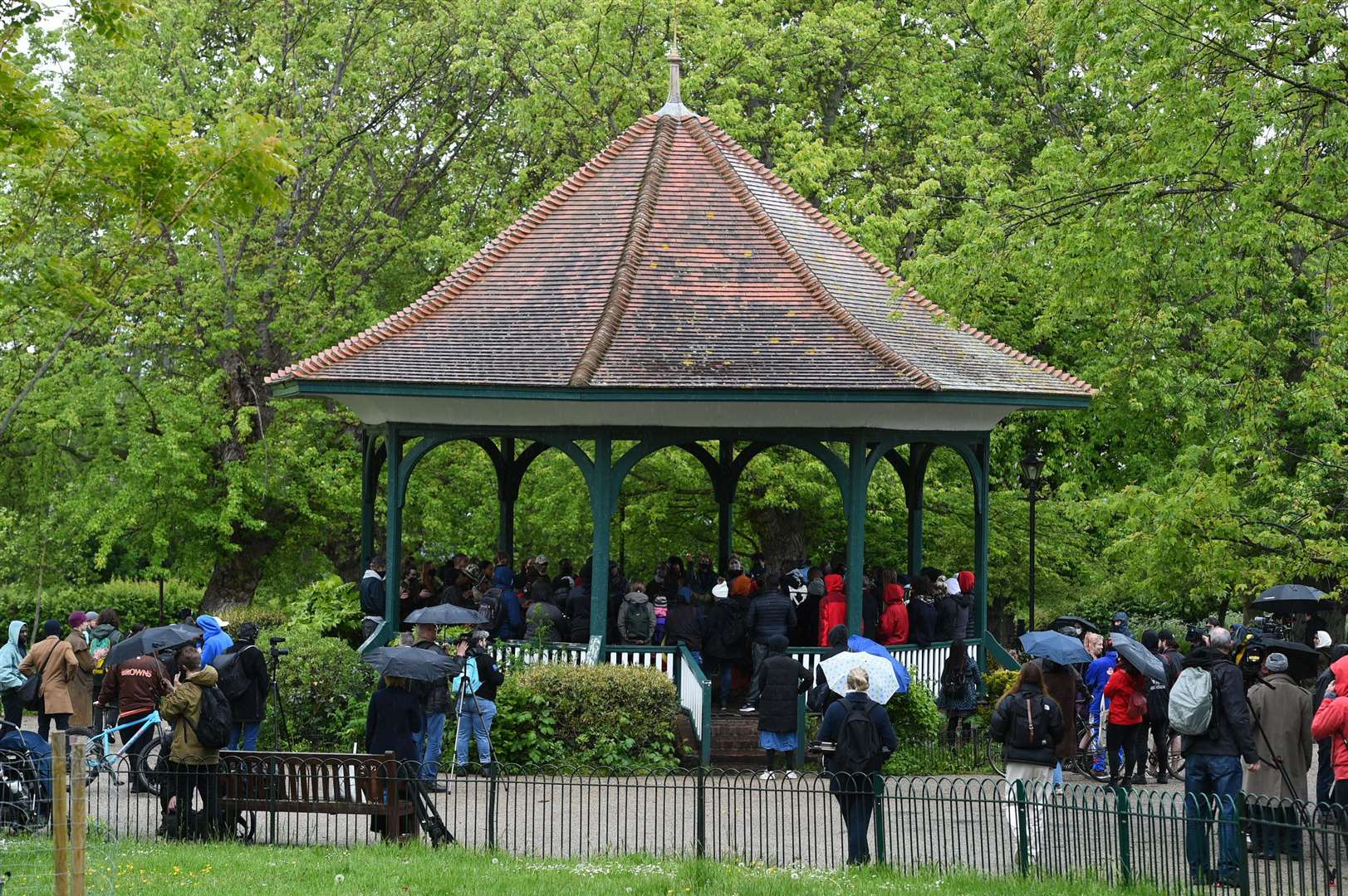 People gathered at a vigil for equal rights activist Sasha Johnson at the bandstand in Ruskin Park, Camberwell, south London (PA)