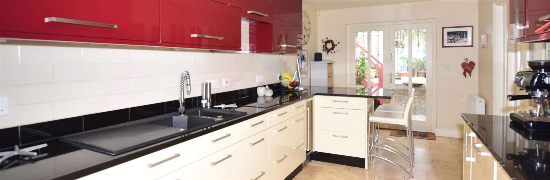 Kitchen has french doors to the garden