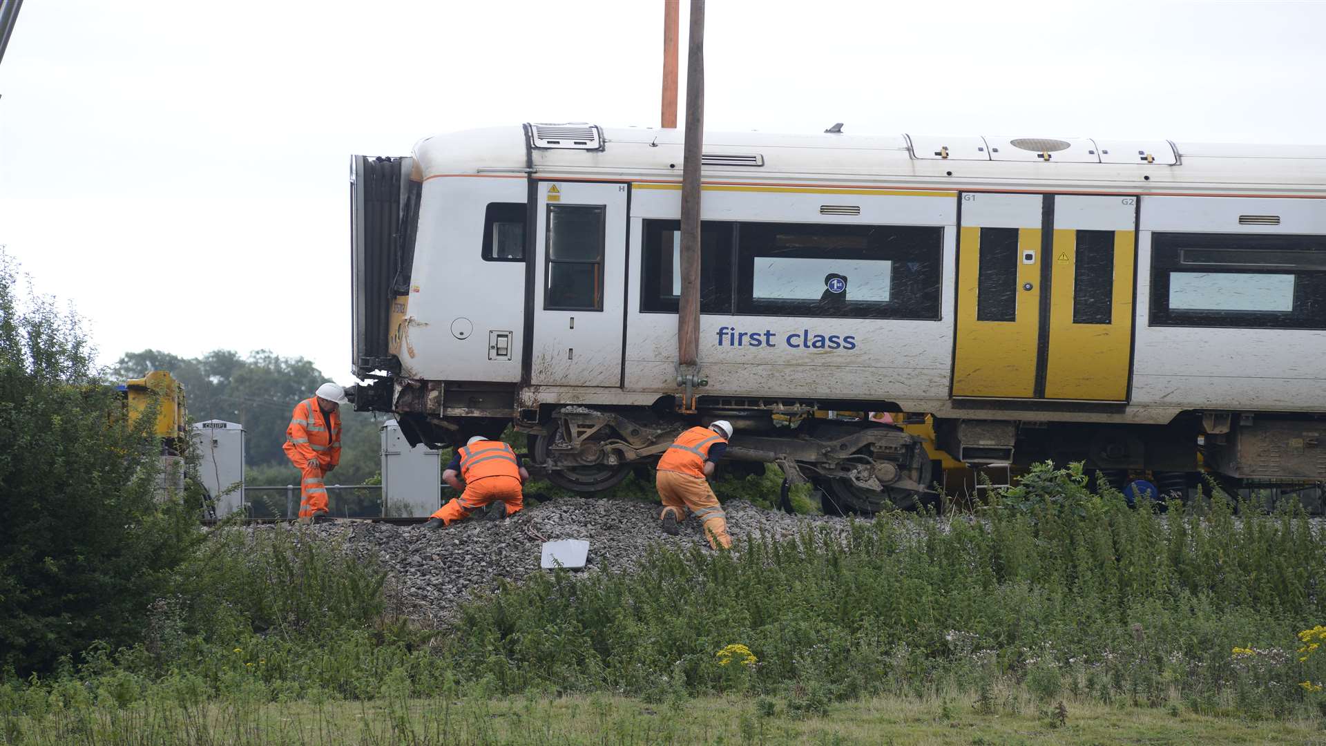 The carriage being lifted back onto the tracks Picture: Paul Amos.