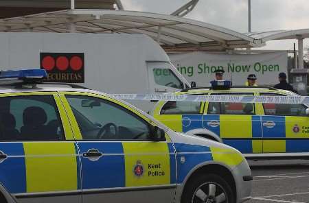 Police officers beside the Securitas van. Picture: MATTHEW McARDLE