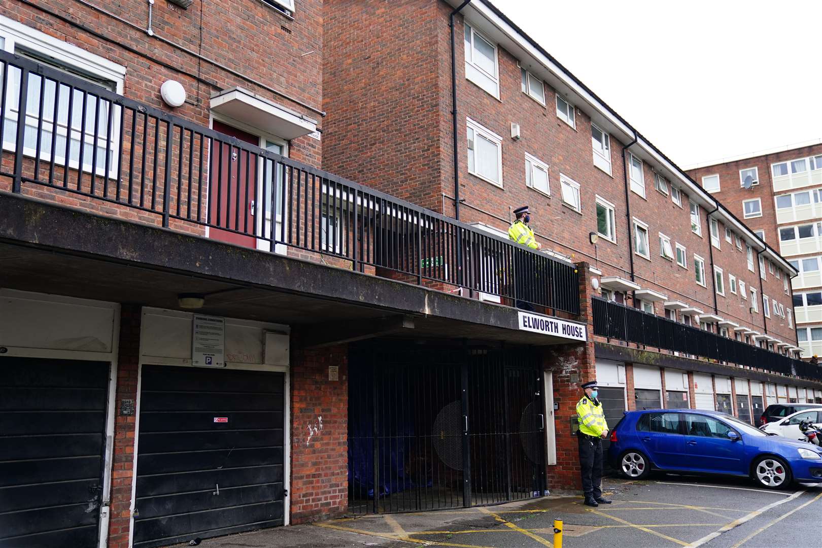 Police at the scene in Oval Place (Victoria Jones/PA)