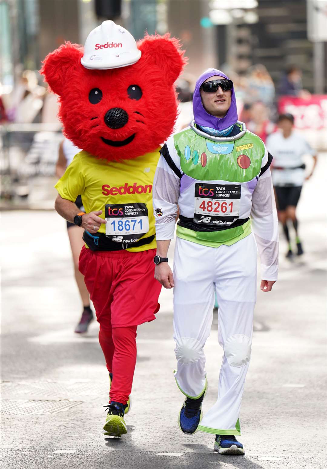 A Seddon teddy and Buzz Lightyear at the London Marathon (James Manning/PA)