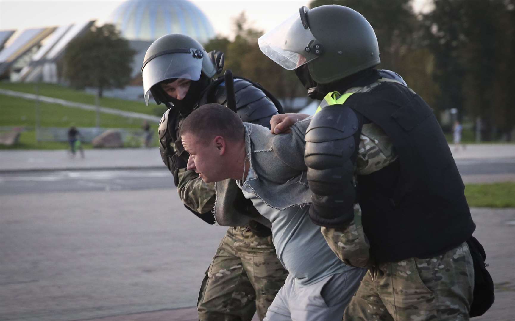 Riot police detain a protester during an opposition rally over Mr Lukashenko (TUT.by/AP)