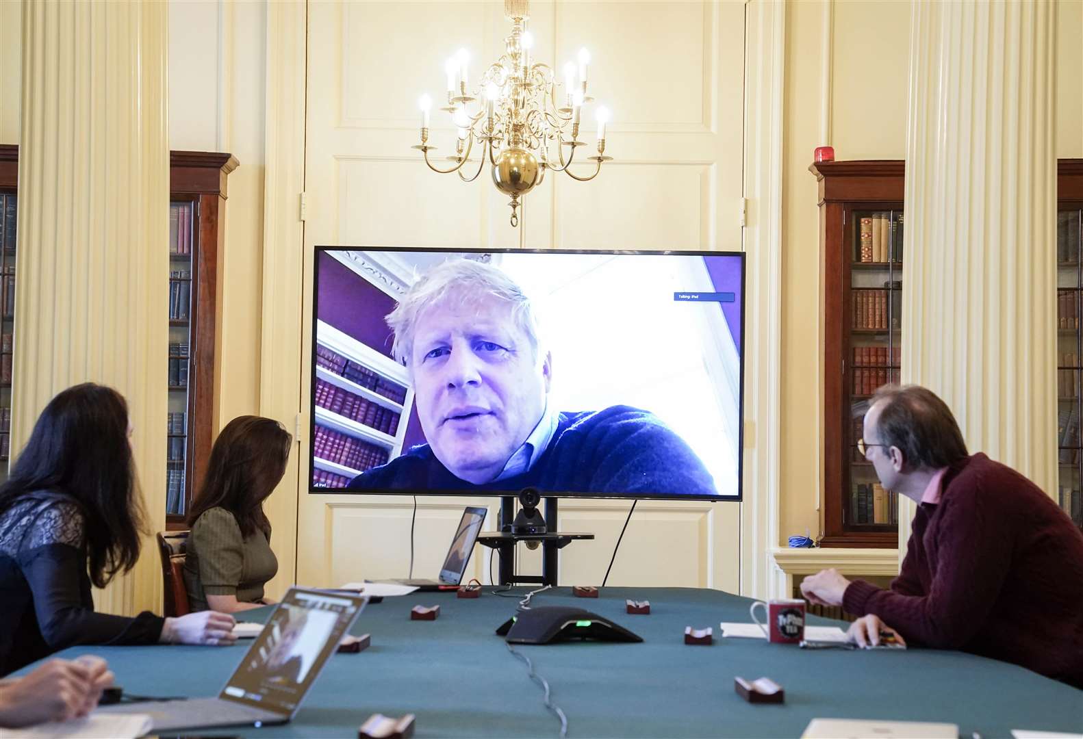 Boris Johnson chairing the morning Covid-19 meeting while self-isolating after testing positive for coronavirus (Andrew Parsons/Crown Copyright/10 Downing Street)
