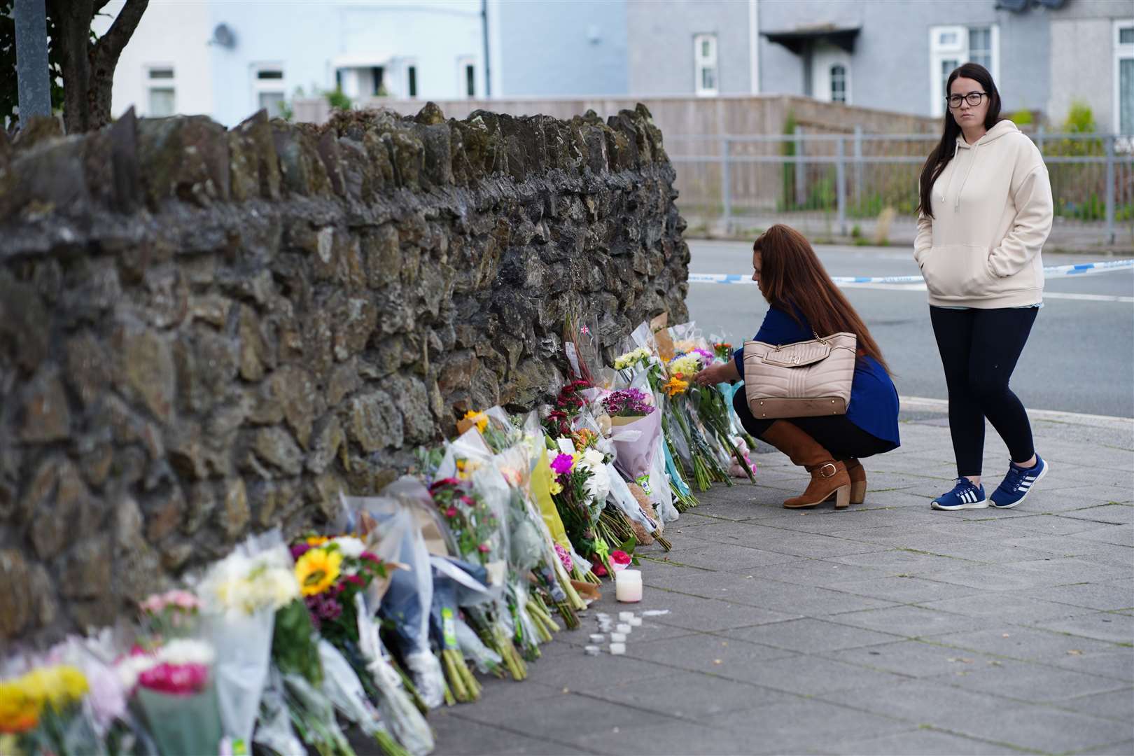 Floral tributes in Keyham (Ben Birchall/PA)