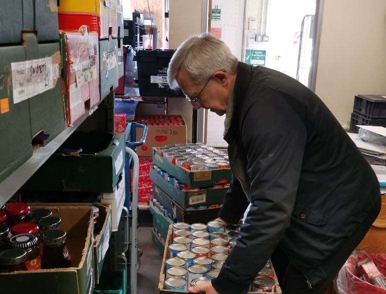A volunteer working at the Medway food bank warehouse