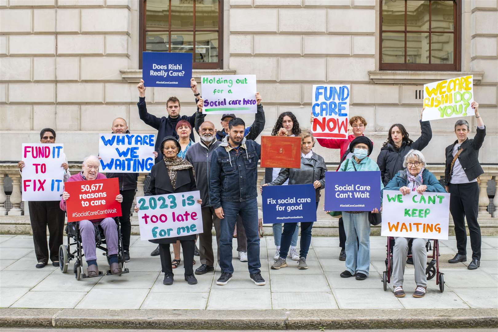 A protest by Age UK and other members of the Care Support Alliance outside the Treasury (Jamie Lau/Age UK/PA)