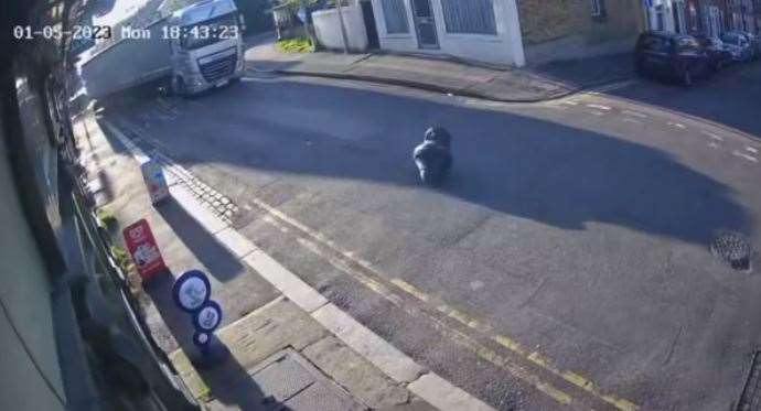 A bollard rolls down the Terrace after being dislodged by a lorry. Image: Terrace Tavern Food and Wine