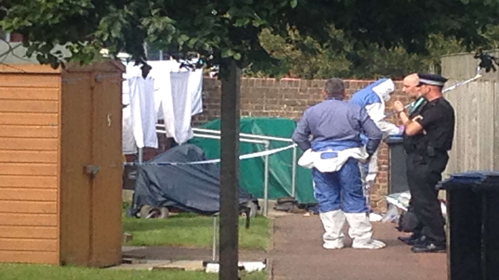 Forensics officers outside the property. Picture: Kiran Kaur