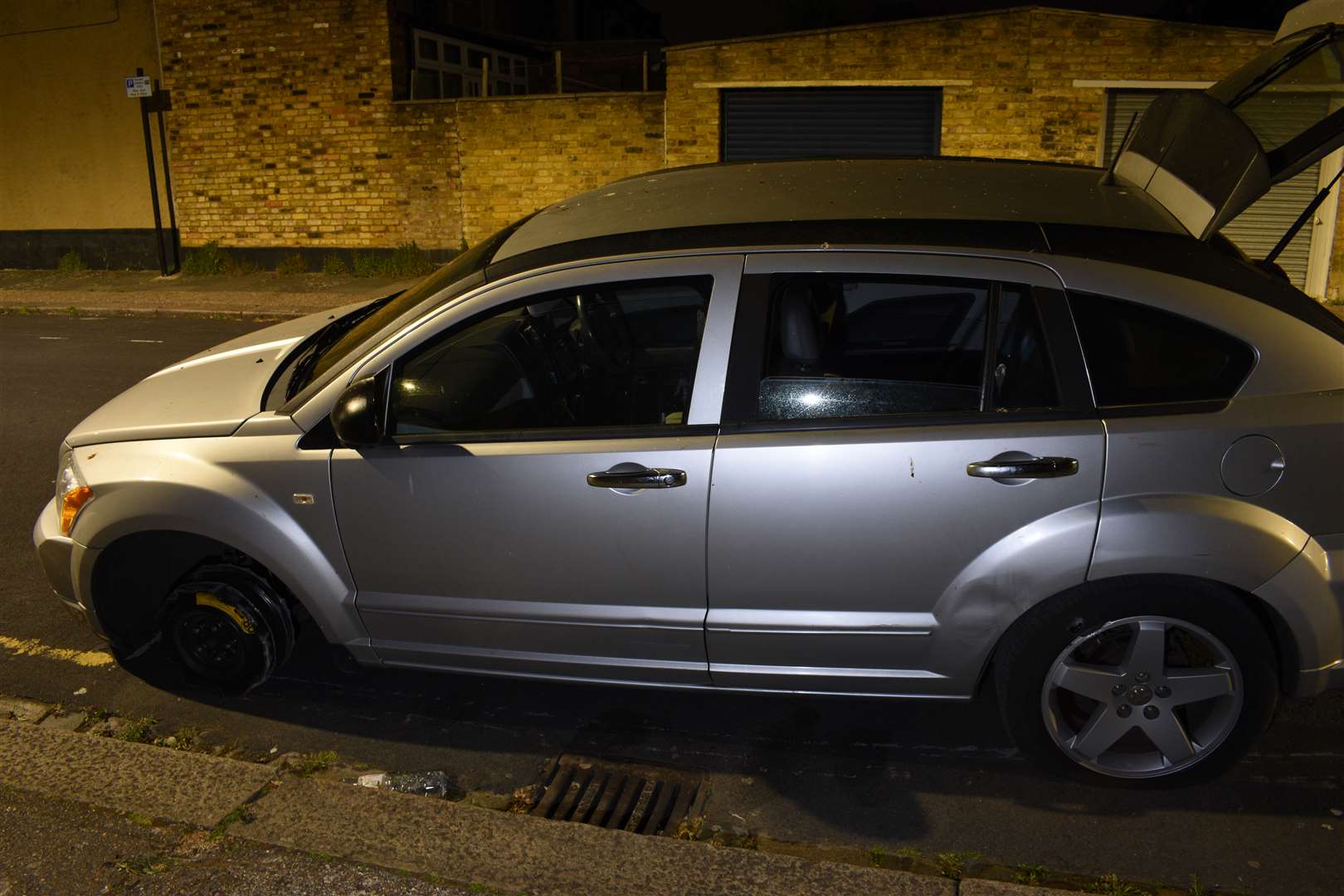 A silver Dodge Caliber that was found abandoned near the scene of the murder of David Gomoh in east London on Sunday (Metropolitan Police/PA)