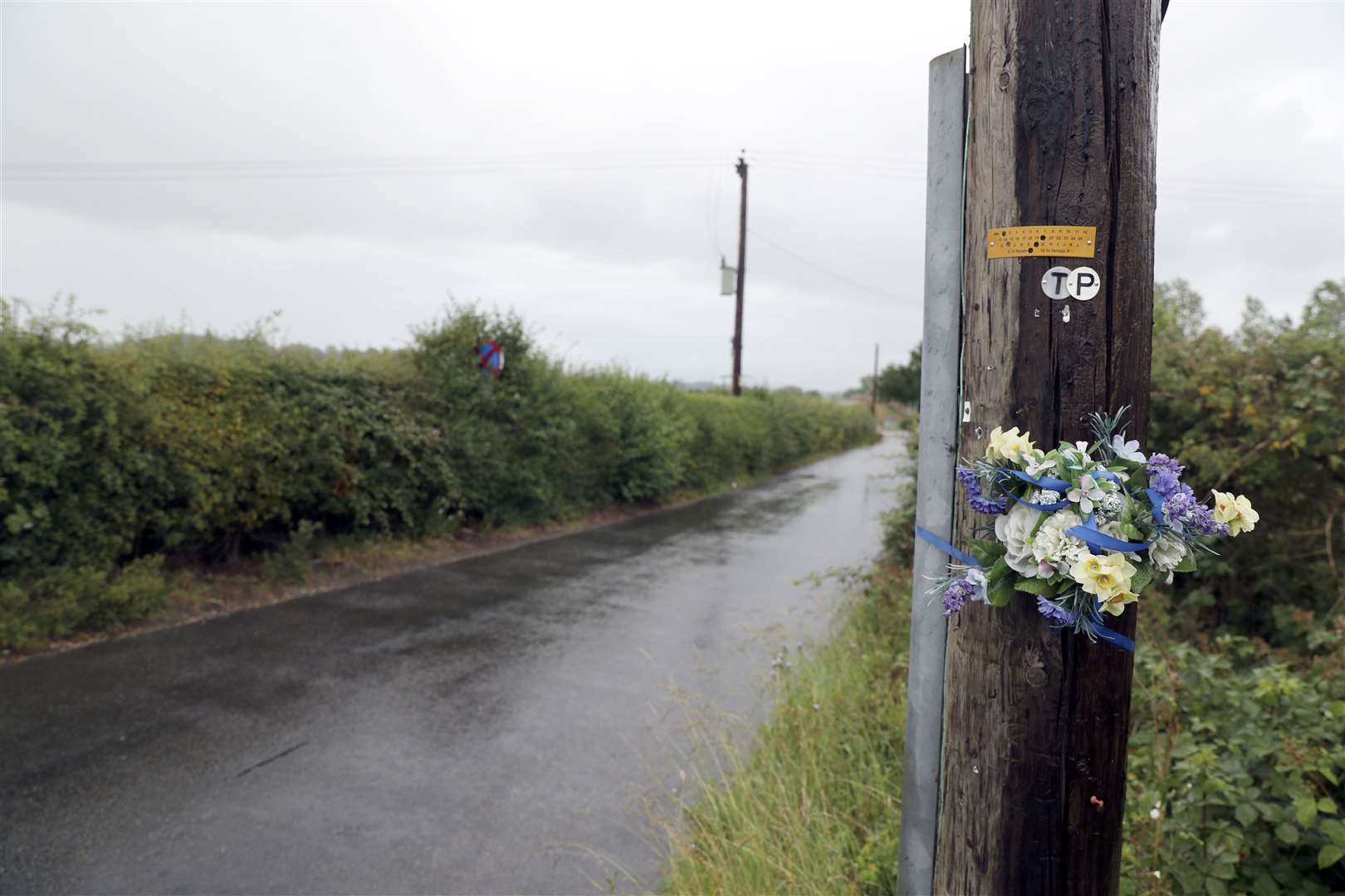 Tributes left in Ufton Lane near Sulhamstead, Berkshire, where PC Andrew Harper died in August 2019. (Steve Parsons/PA)