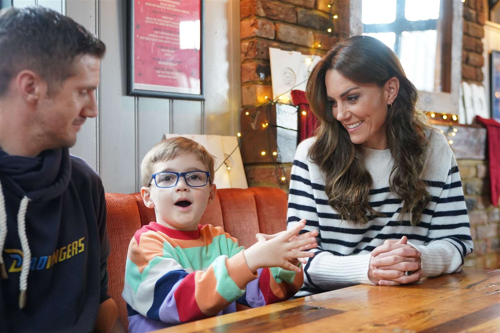 The Princess of Wales meets Grayson Stevenson and his father Mark during a visit to Dadvengers, a community for fathers and their children, in north London (Yui Mok/PA)