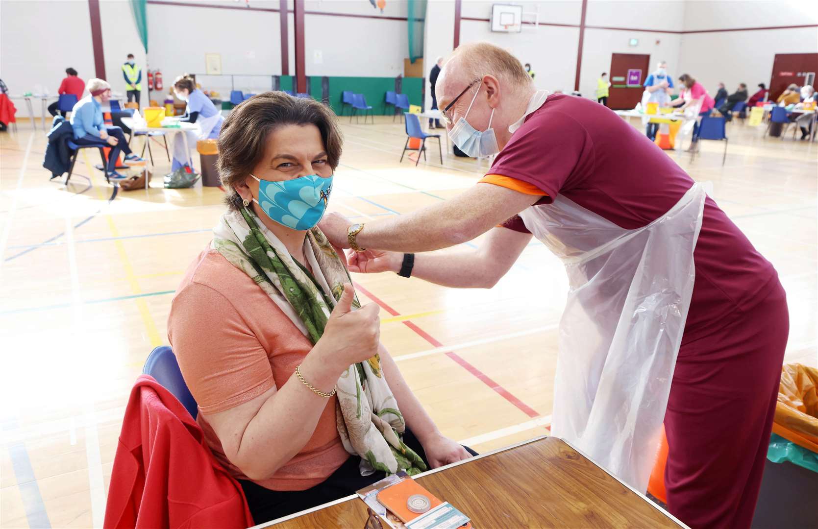 First Minister Arlene Foster receives her first Covid vaccination shot at Castle Park Leisure Centre in Lisnaskea, Co Fermanagh (Kelvin Boyes/Press Eye/PA)