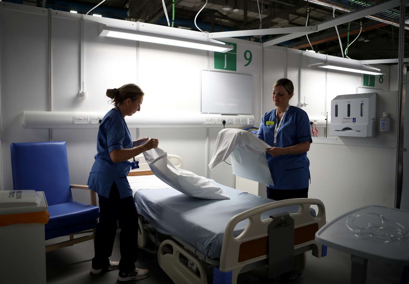 Nurses at the NHS Louisa Jordan hospital, built at the SEC Centre in Glasgow (Jane Barlow/PA)