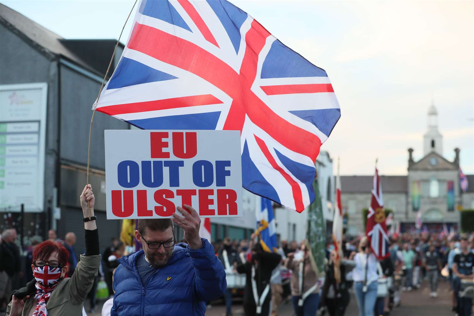 People take part in a loyalist protest in Newtownards, County Down, against the Northern Ireland Protocol (Brian Lawless/PA)