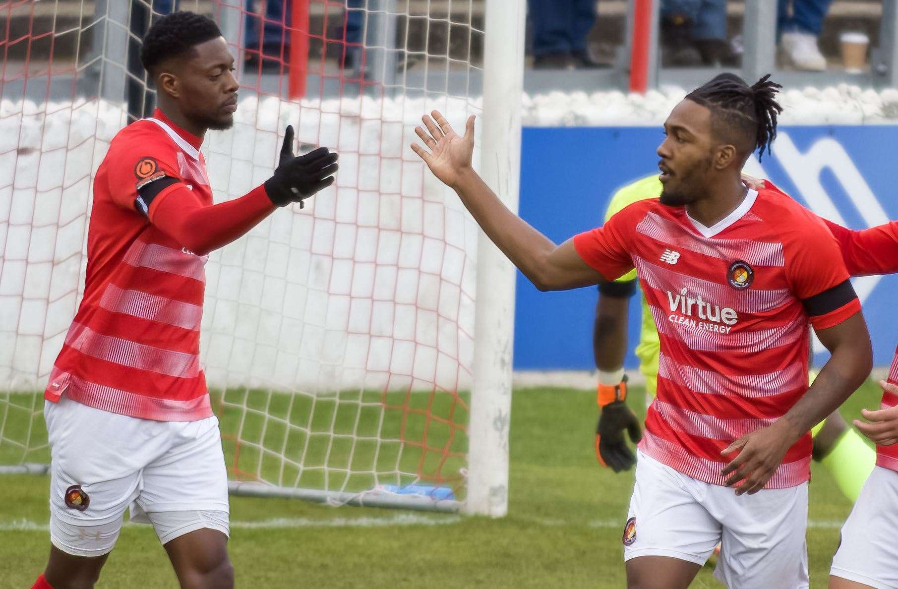 Rakish Bingham, left, and Dominic Poleon celebrate one of their 45 goals this season. Picture: Ed Miller/EUFC