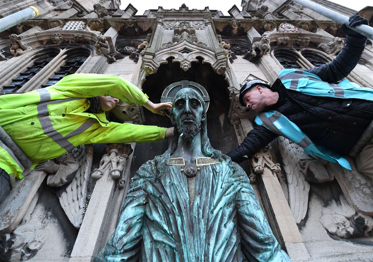 Welcoming Christ statue at the Christ Church Gate of Canterbury Cathedral being taken down in January 2020. Picture: Canterbury Cathedral