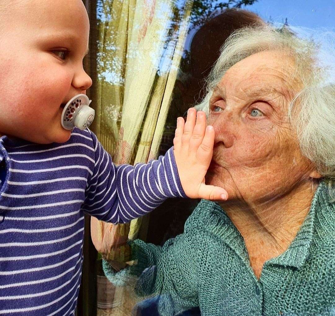 Steph James’ image of her one-year-old son with his great-grandmother (Kensington Palace/PA)