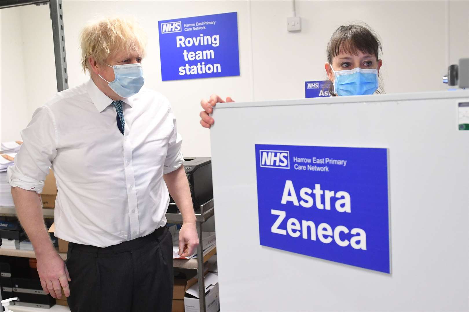 Prime Minister Boris Johnson is shown the distribution operation for sending the Oxford/Astrazeneca coronavirus vaccine out to local clinics during a visit to Barnet FC’s ground at The Hive, north London (Stefan Rousseau/PA)